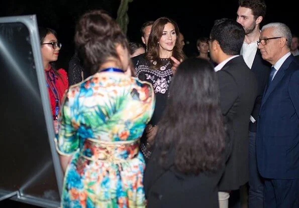 Crown Princess Mary wore Vilshenko black floral embroidered midi dress, and Notes du North lex metallic tweed blazer, Prada bag