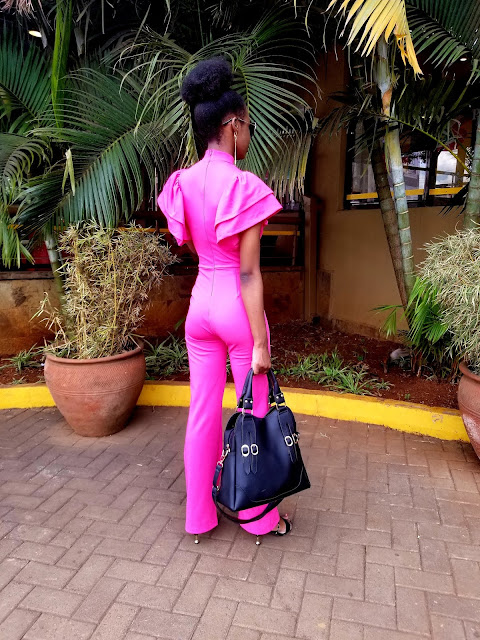 How To Pull Of A Jumpsuit That's Bright Pink