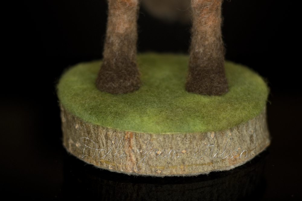 wooden stand with realistic needle felted grass