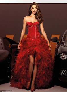 irina shayk red bridal dress and black car