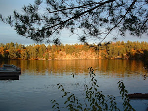 SUNSET AGAINST THE GRANITE SHORE