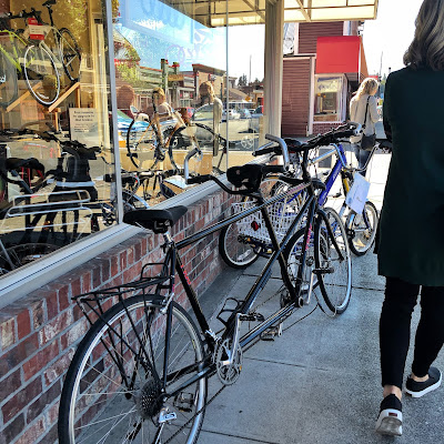 Out front of Arlington Velo Sport Bicycle Shop looking south on Olympic Avenue.