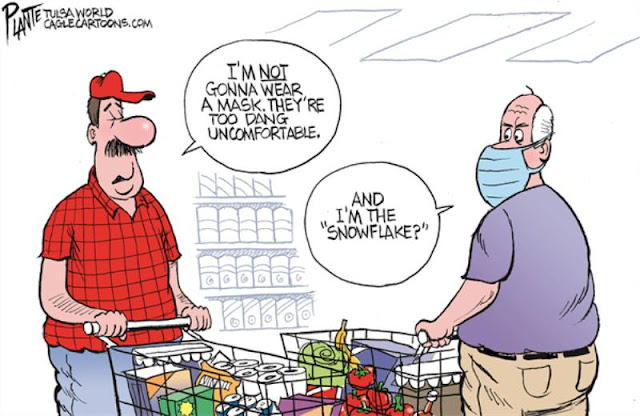 Two men in a grocery store.  Red-shirted one says, 