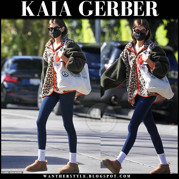 Kaia Gerber in leopard print jacket, leggings and brown boots in LA on