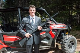 Two of Brad's favorite things; the RZR and Guns!