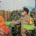 Peduli Pada Warga Terdampak Banjir Rob, TNI-Polri Bagikan Nasi Kotak
