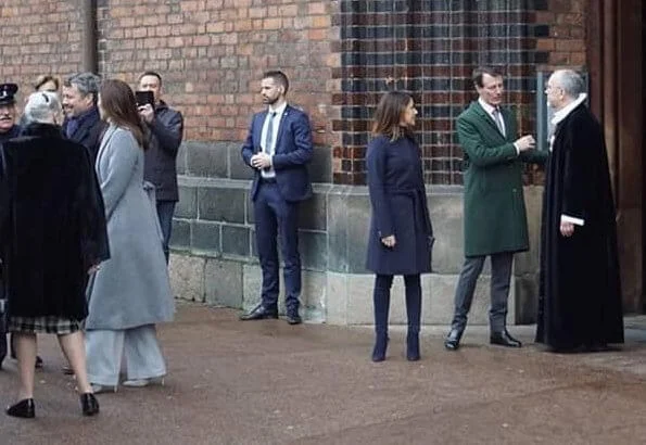 Crown Princess Mary. Princess Marie wore Hugo Boss Casenosa tie-waist coat in Italian virgin wool with cashmere in navy