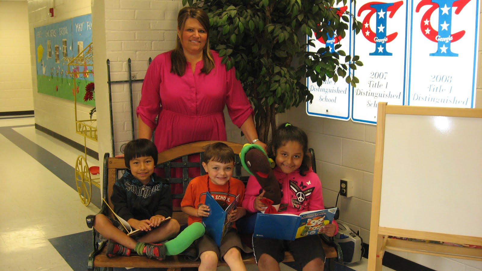 Hometown Mobile Toys for Tots and Exchange distribute books for summer