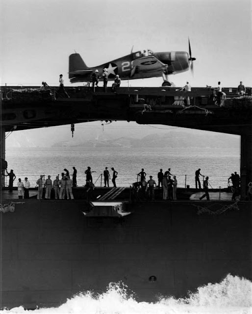 USS Yorktown, showing a F6F Hellcat and the hangar catapult, worldwartwo.filminspector.com