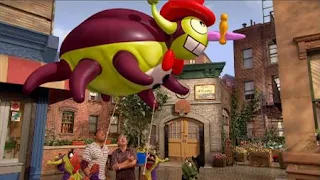 the giant balloon of Stenchy the Stinkbug, Alan, Chris, Oscar the Grouch, Sesame Street Episode 4324 Trashgiving Day season 43