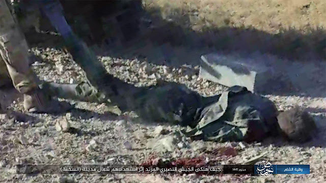 شاهد صور تدمير آلية لقوات النظام وكذلك جثث القتلى شمال السخنة ن