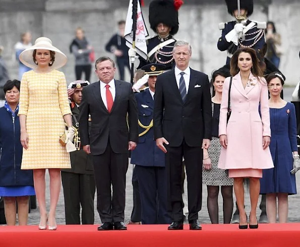 King Philippe and Queen Mathilde of Belgium welcome King Abdullah and Queen Rania of Jordan during an official welcome ceremony at the Royal Palace in Brussels