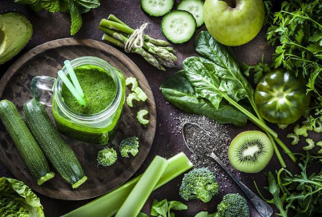 Does Green Juice Have Benefits? How To Drink? Green%2Bfruits%2Band%2Bvegetables%2Band%2Bgreen%2Bjuices%2Bare%2Bplaced%2Bon%2Bthe%2Bwooden%2Btable