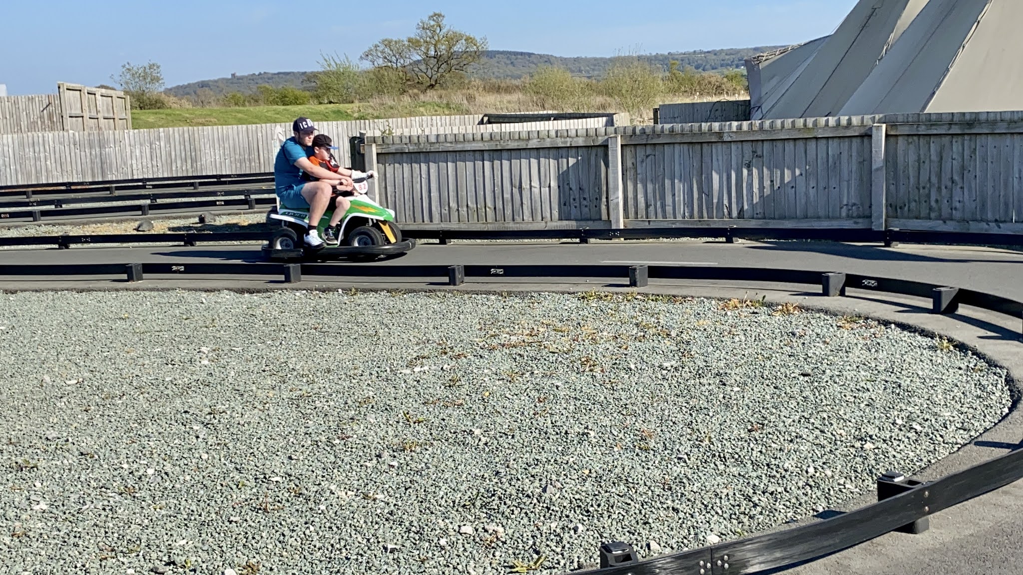 two boys on a quad bike