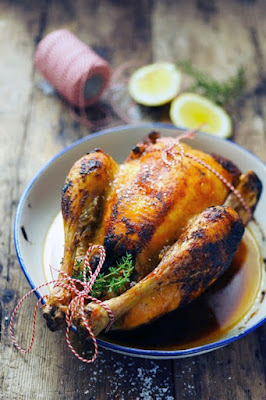 Roasted chicken with lemon, thyme, garlic and paprika