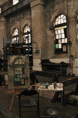 Plein air oil painting of windows in the interior of the Large Erecting Shop in the Eveleigh Railway Workshops painted by industrial heritage artist Jane Bennett