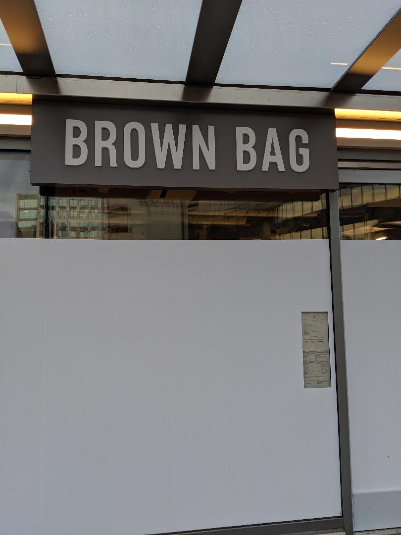 Robert Dyer Bethesda Row Sign installed at Brown Bag in Bethesda