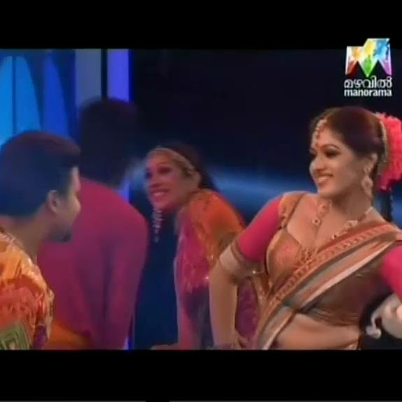 Meghna Raj hot navel show in saree