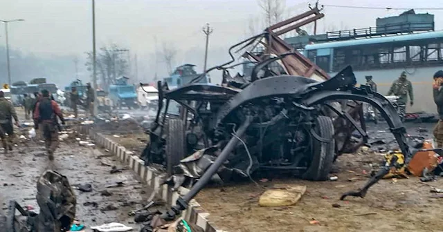 Image Attribute: The site of the Pulwama attack resembled a war zone with body parts and vehicle debris is strewn about / Date: February 14, 2019. / Source: Reuters