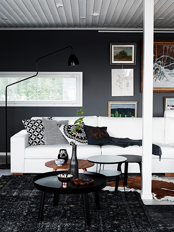 Eclectic finnish home with black walls. Photo by Krista Keltanen