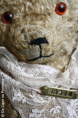 Detail of a worn face teddy bear