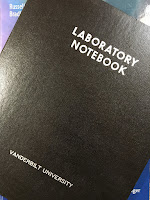 Vanderbilt Research Notebook 11, superimposed on Intermediate Physics for Medicine and Biology.