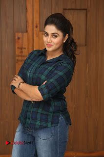 Actress Poorna Stills in Denim Jeans at Jayammu Nischayammu Raa Movie Interview  0155