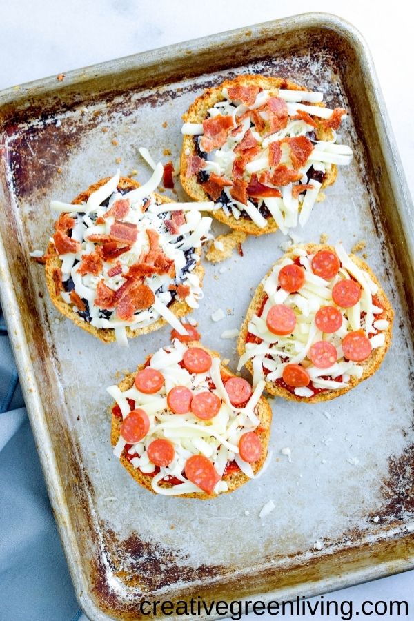 Use Canyon Bakehouse English muffins to make an easy crust for gluten free mini pizzas! They make a perfect pizza base for this easy kid friendly lunch recipe. Personalize them any way - even make them dairy free or vegetarian. Let kids choose their own healthy toppings for DIY personal pizza activity.