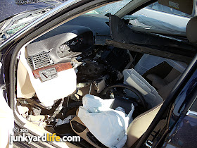 2003 BMW 325i head-on collision drivers side interior photo.