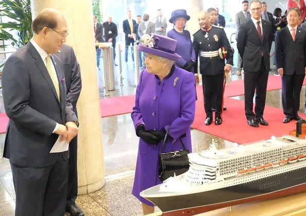 Britain's Queen Elizabeth II visited the International Maritime Organization (IMO) in London