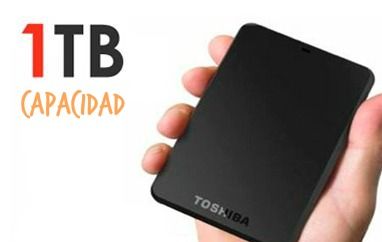 disco duro portatil toshiba de 1tb (terabyte) en mano