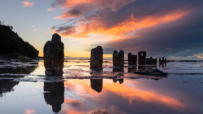 HD wallpaper stone columns on the beach HD wallpaper stone columns on the beach