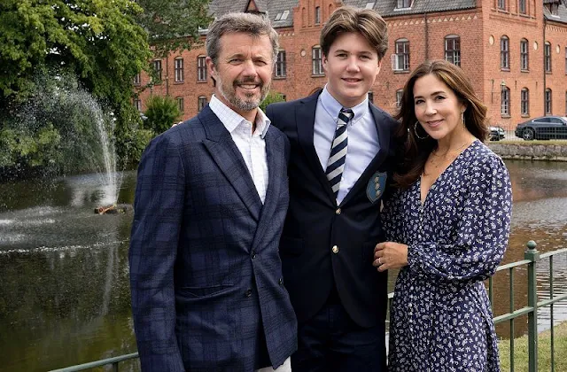 Crown Prince Frederik and Crown Princess Mary. Moss & Spy navy floral broderie anglaise cotton v-shaped front neckline dress. Beulah London dress