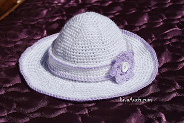 wide brimmed childs sunhat with detatcable crochet headband with flower