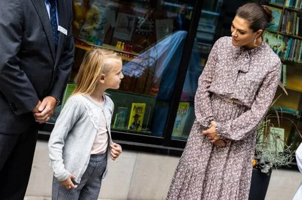 Crown Princess Victoria wore a Pattriina floral print long dress from Andiata and Victoria wore an Odnala  wool cashmere jacket from Andiata