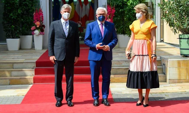 Princess Sophie wore a lemon print fit and flare midi dress from Oscar De La Renta. Mathilde wore a light pink and black skirt and yellow top