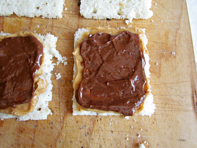 Overhead shot of bread with peanut butter and nutella on it