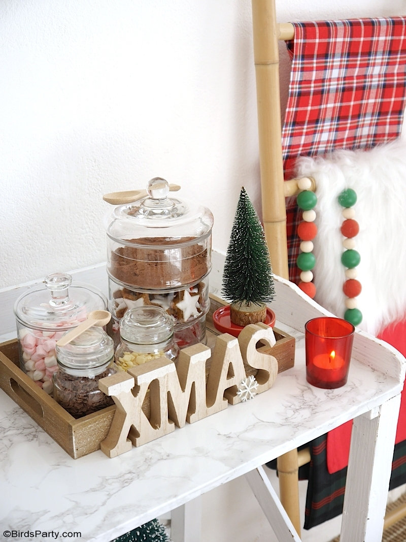 How to Set Up a Hot Chocolate Bar for The Holidays - festive Christmas decor, hot cocoa bar toppings and ideas for styling a hot drinks station at home! by BirdsParty @birdsparty.com #hotcocoa #hotcocoabar #hotchocolate #hotchocolatebar #hotcocoastation #hotchocolatestation #christmas #christmashotcocoabar #christmashotchocolate #christmashotcocoa #holidayhotcocoabar #christmasdecor #farmhousedecor #farmhousechristmas #cocoabar #coffeestation #coffeebar
