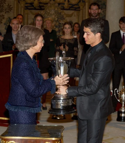 Queen Sofia presents Real Madrid's player Cristiano Ronaldo with the Ibero-American Community Trophy