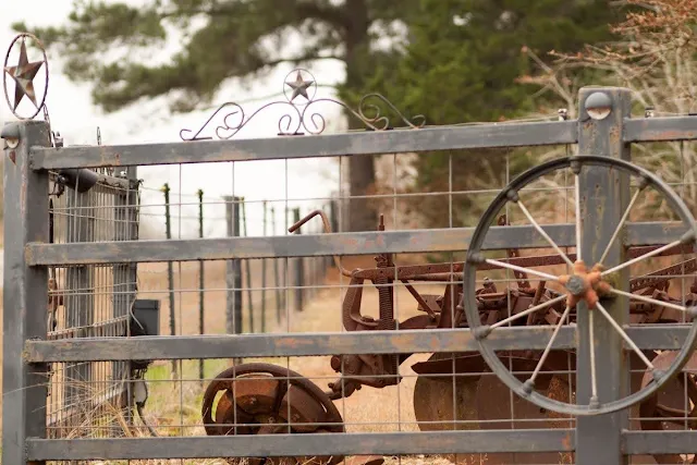 Farm equipment and a lone star on an Austin to Houston drive in Texas