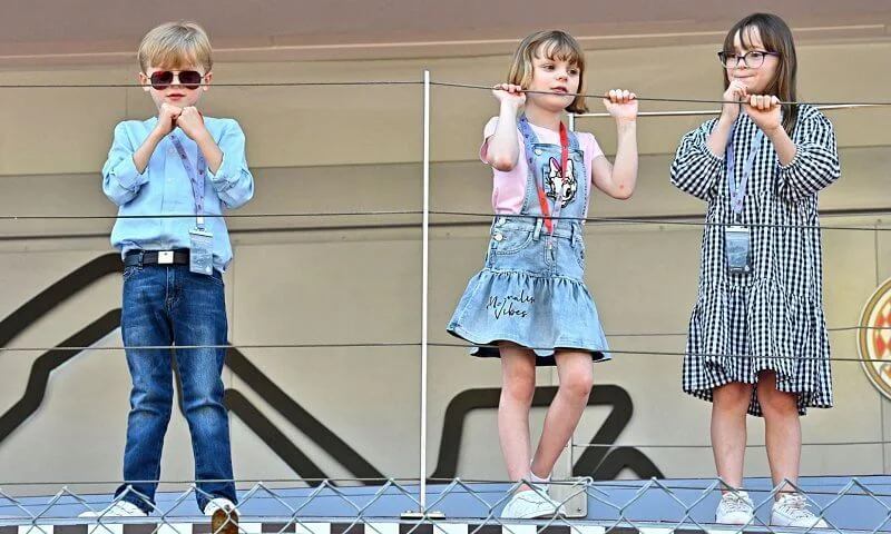 Princess Gabriella wore a blue denim daisy duck dress from Monnalisa. Prince Jacques, Pierre Casiraghi and Kaia Rose Wittstock