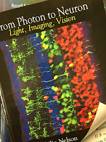 From Photon to Neuron: Light, Imaging, Vision, by Philip Nelson, superimposed on Intermediate Physics for Medicine and Biology.