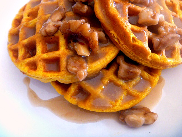 Pumpkin Waffles with Maple Walnut Cream Syrup:  With an easy to make batter these toasty and fluffy waffles, bursting with warm spices and pumpkin flavors, will be on your table in no time. - Make Ahead for Thanksgiving morning! - Slice of Southern