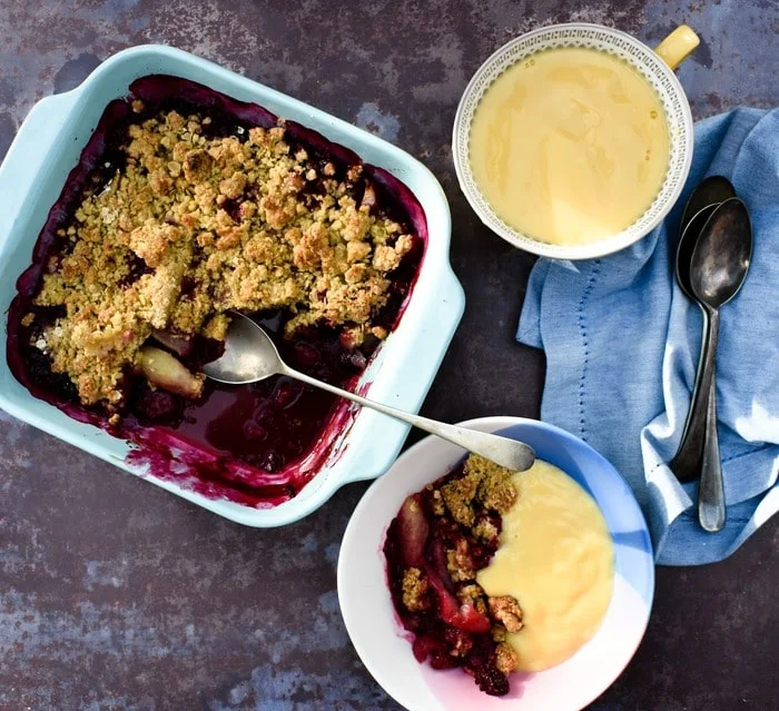 Scottish Blackberry & Pear Crumble served up in bowls with custard