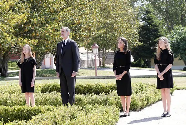 King Felipe, Queen Letizia, Princess Leonor and Infanta Sofia observed a minute's silence for victims of the coronavirus. Felipe Varela dress