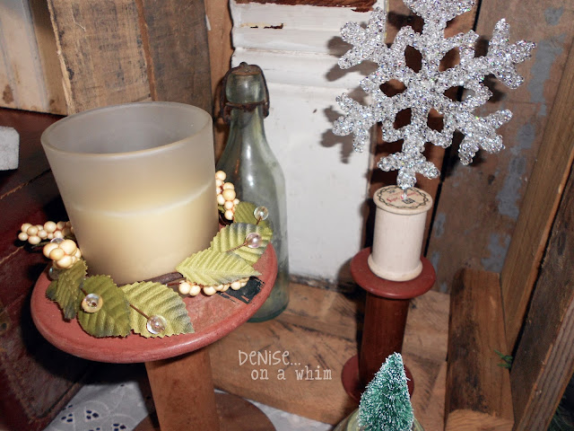 Vintage Spools and Snowflakes in a Christmas Vignette via http://deniseonawhim.blogspot.com