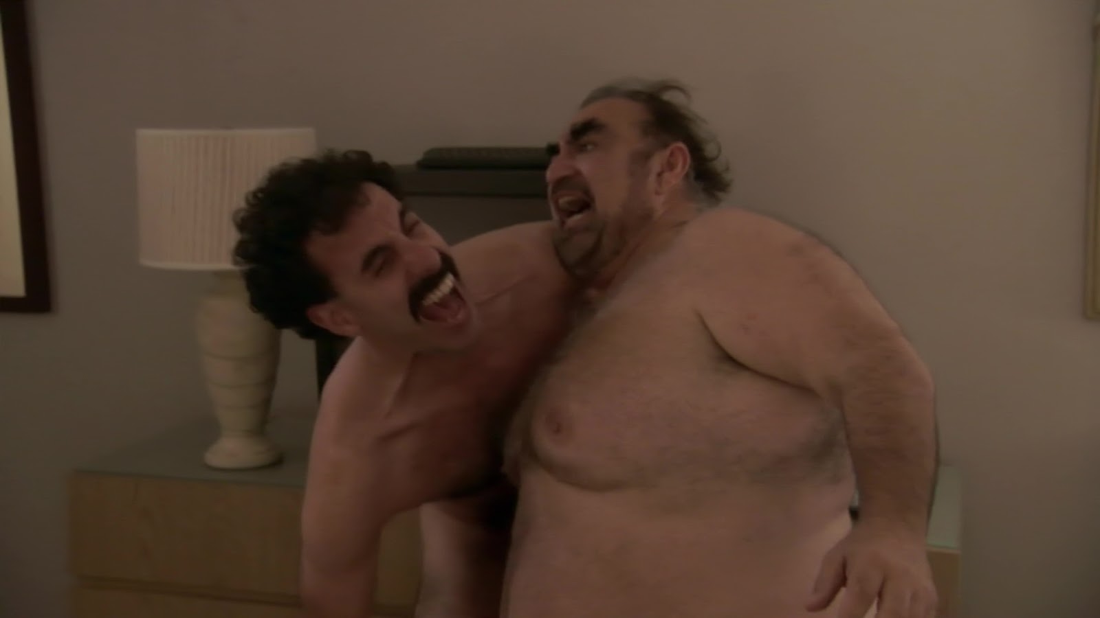 Sacha Baron Cohen and Ken Davitian nude in Borat.