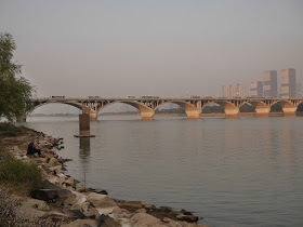 two men fishing and the Juzizhou Bridge in Changsha