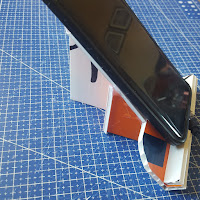 I made a horizontal / vertical cell phone holder. It will be perfect for instructional videos while making repairs or recipes while cooking.  - Coroplast DIY - CoroplastCreations.com - photos by: HalifaxSportsPhotos.ca