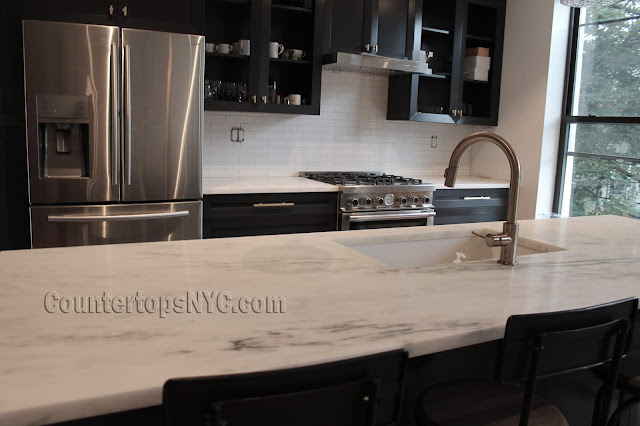 Kitchen with white marble countertop